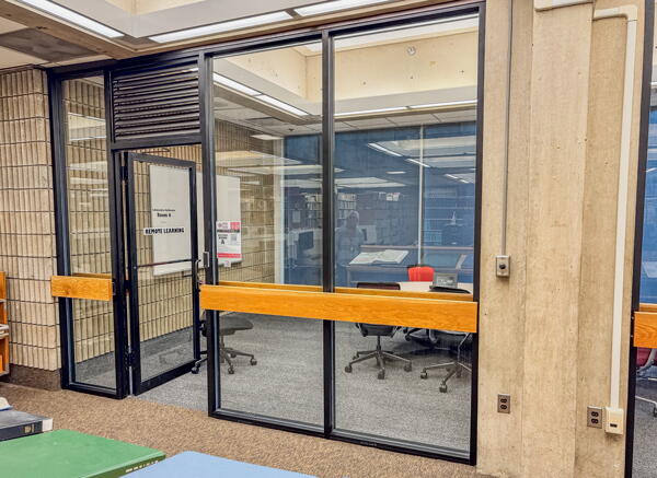 Glass wall and door entrance into study room