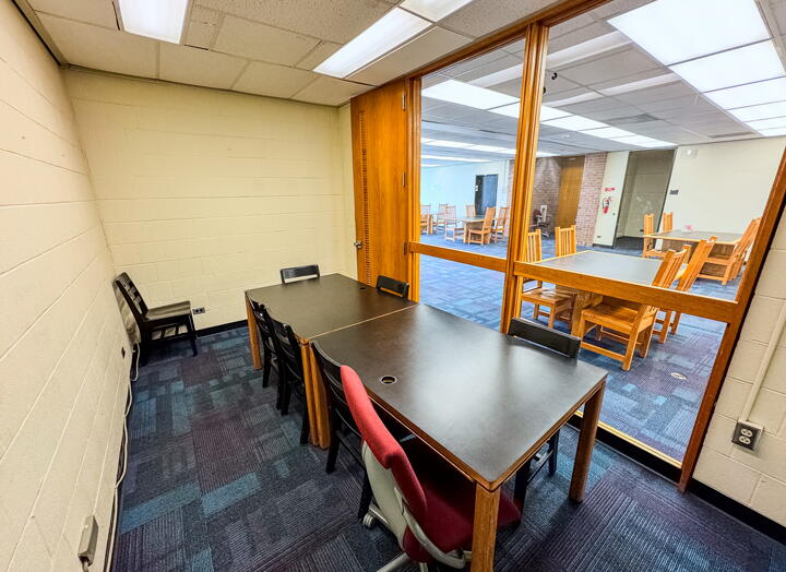 Interior of group study room with a large table and chairs