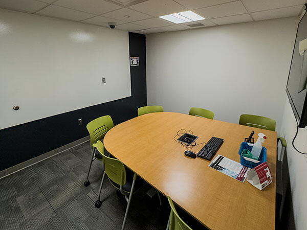 Interior View of Robeson Study Room 257, Highlighting Workspace and Whiteboard
