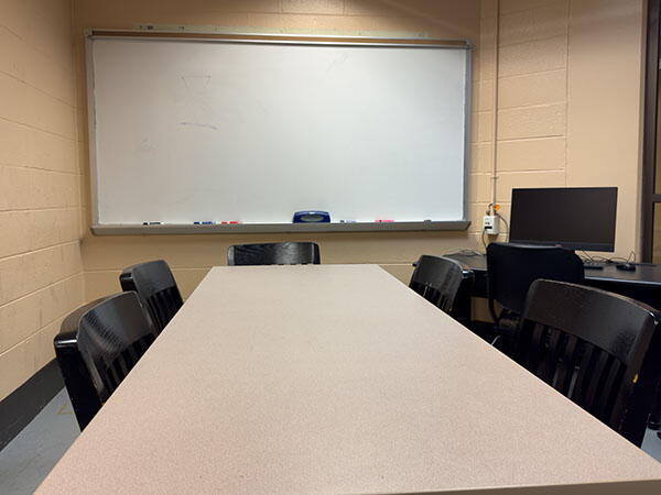 Interior View of Robeson Study Room L14, Highlighting Table Space and Whiteboard