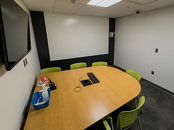 Interior View of Robeson Study Room 251, Highlighting Workspace and Whiteboard